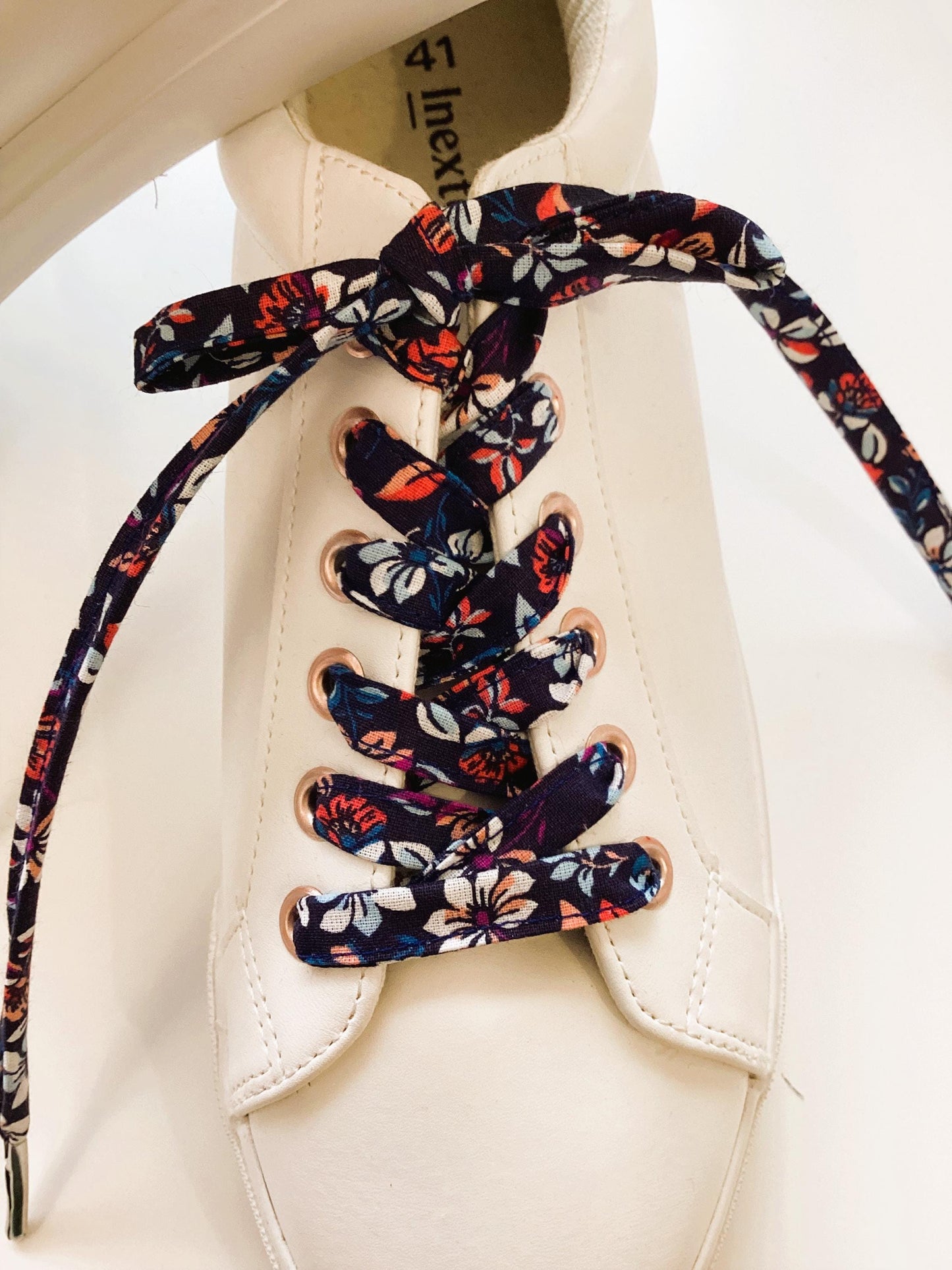 Lacets en coton fleuri